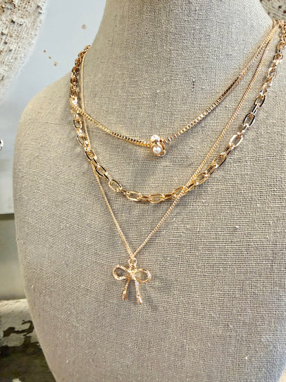 Multi-Layer Pearl Bow Charm Necklace