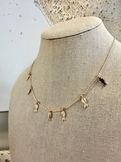Delicate fish charm pendant stationed fine chain